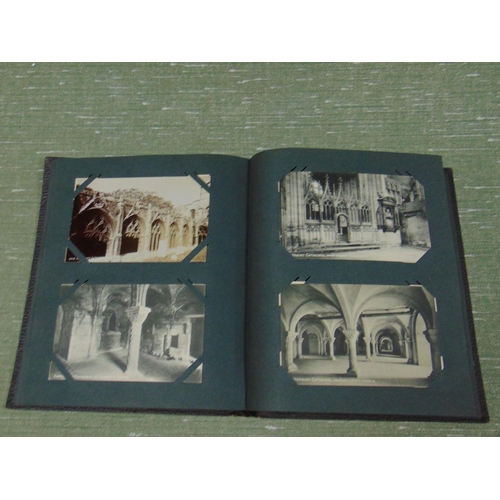 204 - Postcard album and contents.