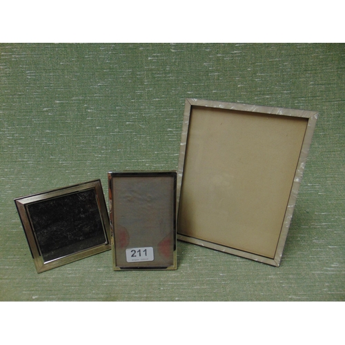 211 - Silver rectangular photograph frame, and two other frames.