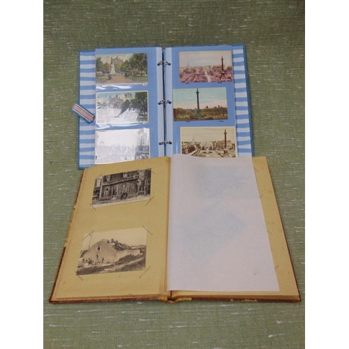 245 - Post card album and contents.