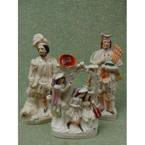 256 - 19th century Staffordshire spill vase, The rivals, and two other examples.