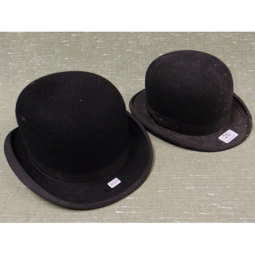 26 - Gieves of London bowler hat and one other example. (2)