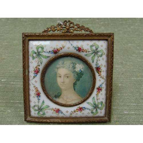 29 - Gilt framed porcelain circular miniature portrait of a lady, 2.5