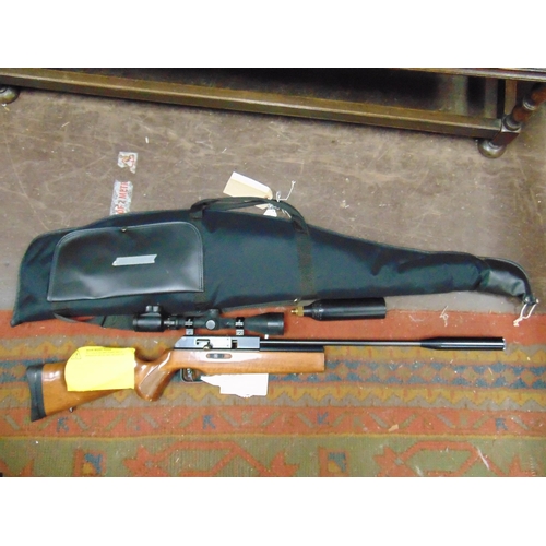 30 - Bolt action air rifle with scope, in slip. Please note: Purchasers must be over 18 and photographic ... 