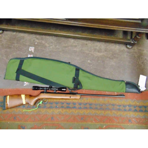 31 - Simmons super sport air rifle with scope, in slip. Please note: Purchasers must be over 18 and photo... 