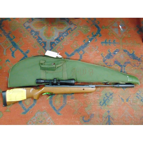 42 - SMK 19 .22 air rifle with scope, in slip. Please note: Purchasers must be over 18 and photographic I... 