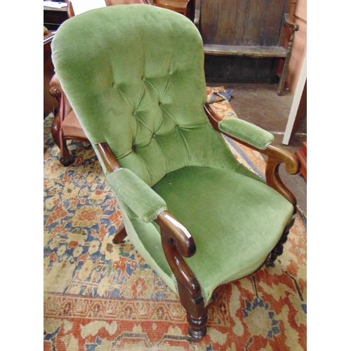 423 - 19th century mahogany framed Gentlemans chair, button back, all over upholstery, scroll arms, on tur... 