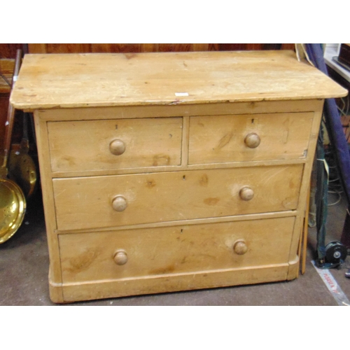 426 - Victorian pine chest of two short and two long drawers with knob handles and on platform base. 31 x ... 