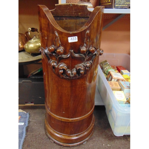 433 - Continental walnut stick stand, having moulded decoration, 32