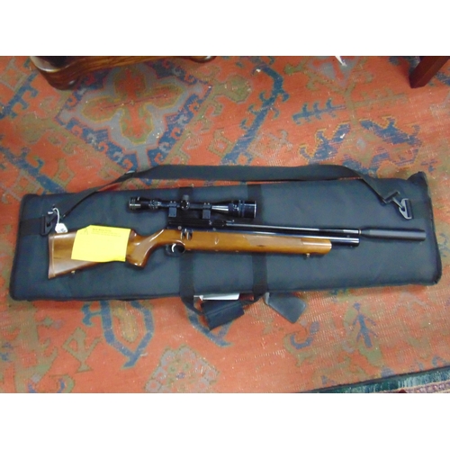 44 - AXSOR bolt action gas powered rifle with scope, in slip. Please note: Purchasers must be over 18 and... 