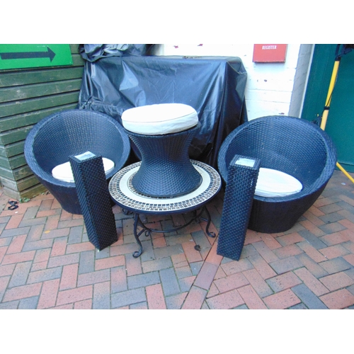 460 - Pair of Rattan chairs and a mosaic table.