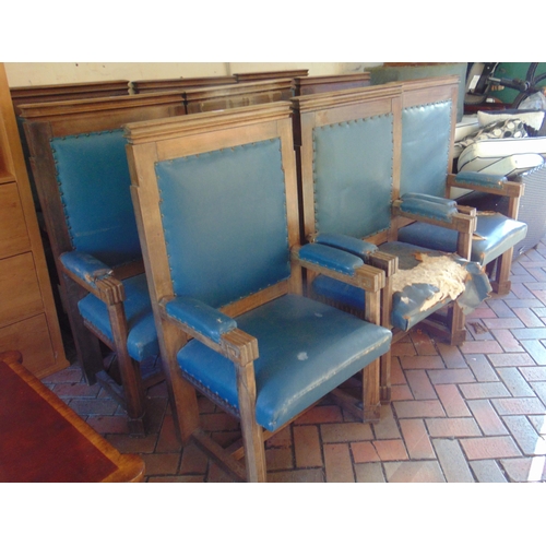 466 - Set of nine oak framed chairs, of stout construction, hide upholstered backs arms and seats, on plai... 