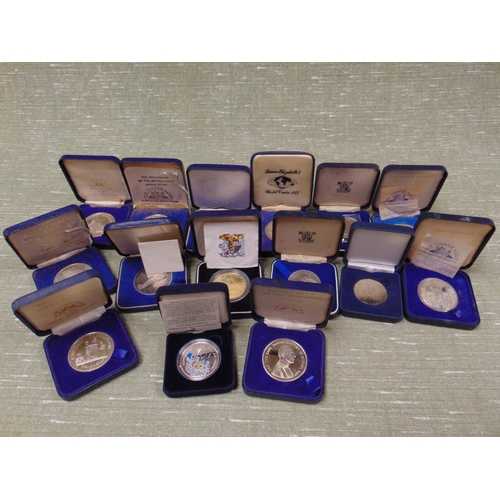 72 - Collection of cased commemorative coins.