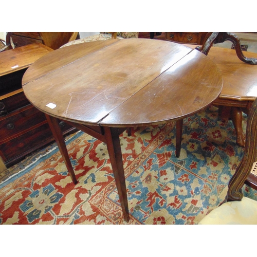 320 - 19th century mahogany Pembroke table, oval top with drop leaves, end drawer and on tapered supports.... 