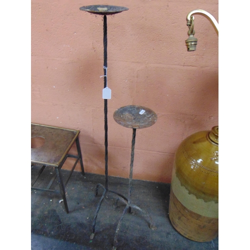 100 - Two metal candle holders, the tallest 36