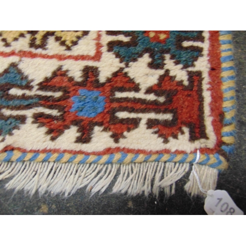 108 - Red and blue ground rug, having geometric pattern. 76 X 59