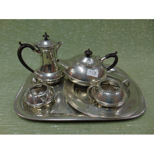 122 - Hammered pewter six piece tea service.