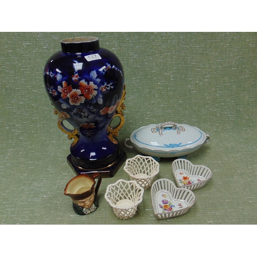 127 - Large blue and white floral two handled vase, oval tureen, Doulton character jug, etc.