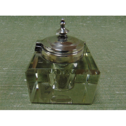 148 - Square form glass inkwell, having plated mount.