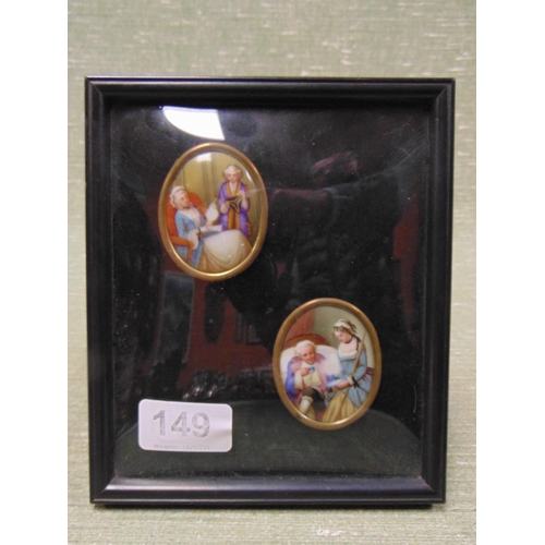 149 - Pair of framed and glazed oval porcelain miniatures, classical scenes.