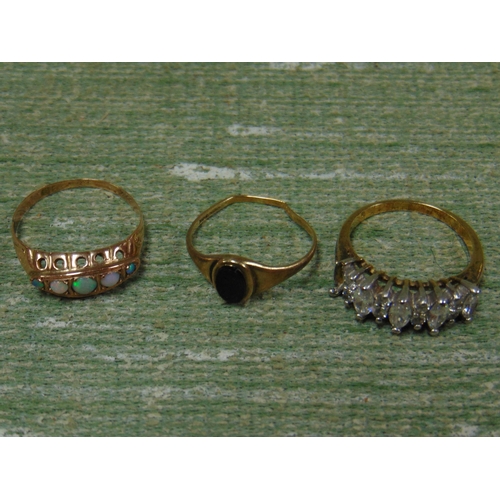 196 - Two gold rings and one other example (3).