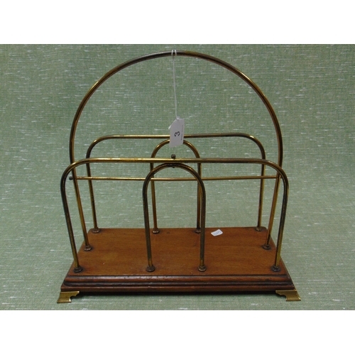 3 - Edwardian brass magazine rack of shaped design, set on rectangular oak base and bracket feet. 14 x 1... 