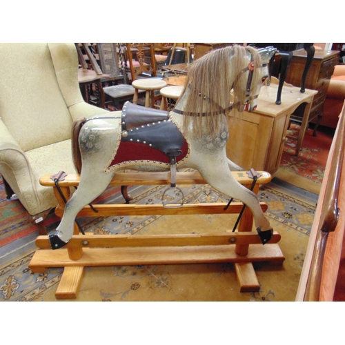 335 - Leo Stinchon dapple grey wooden painted rocking horse  on stand,  50 x 47 x 11