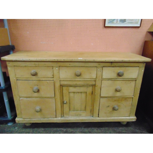 364 - Victorian pine dresser base, three short drawers, over central cupboard door, flanked by further two... 