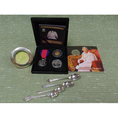 408 - Reproduction Waterloo medal, small quantity of silver spoons, etc.