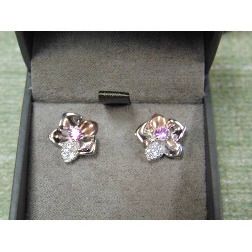 416 - Boxed pair of Clogau silver and rose gold sapphire earrings.