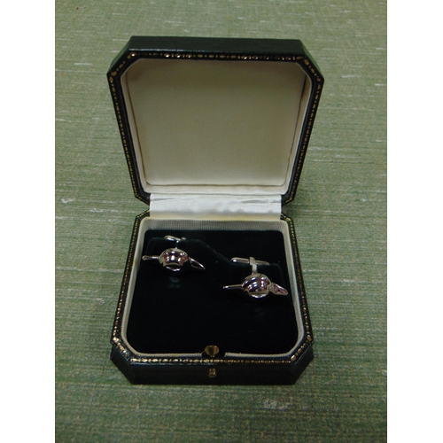 419 - Boxed and cased pair of silver Aston Martin cufflinks.