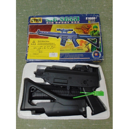 50 - Boxed Cyma SIG SG551 air rifle BB gun. Please note: Purchasers must be over 18 and photographic ID m... 