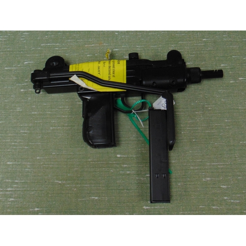 58 - Replica BB 9mm Uzi gun. Please note: Purchasers must be over 18 and photographic ID must be produced... 