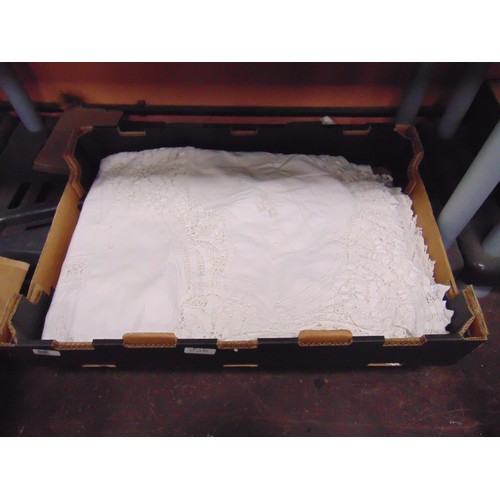 238 - Good box of lace edged table cloths.