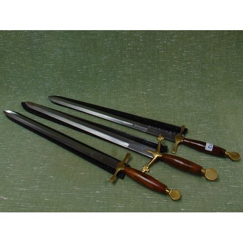 112 - Three ornamental swords in scabbards. Please note: This lot CANNOT BE SHIPPED.