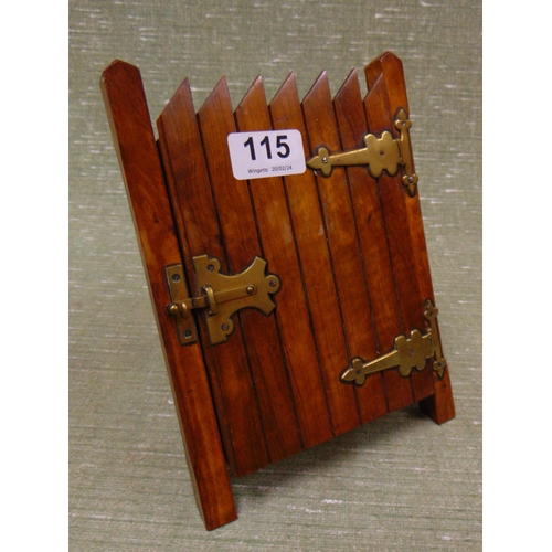 115 - Unusual photograph frame, in the form of a brass bound wooden slatted gate, 5 x 4