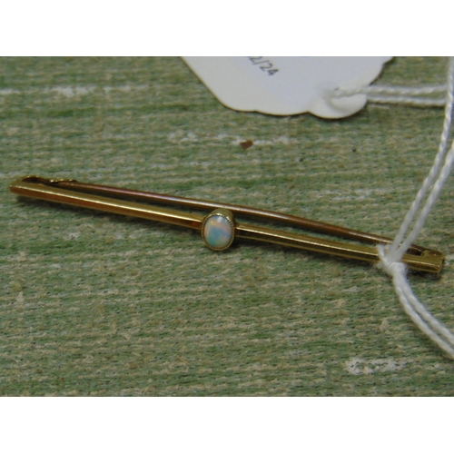 165 - Cased 15 ct gold bar brooch, set with opal stone.