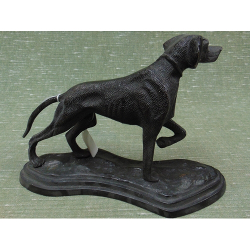 214 - Bronze type figure of a dog, set on naturalistic base, 8 x 10