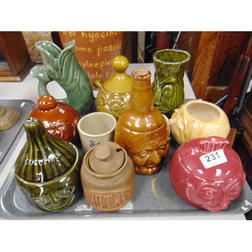 231 - Various pottery preserve jars, fish gurgler jug, etc.