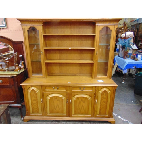 359 - An oak effect dining suite, comprising extending table, four chairs and a dresser.