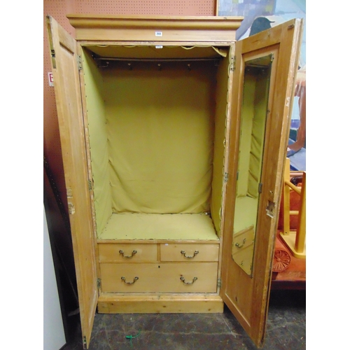 368 - Victorian pine double door wardrobe, ogive cornice above arched panels, fitted interior, brass knob ... 