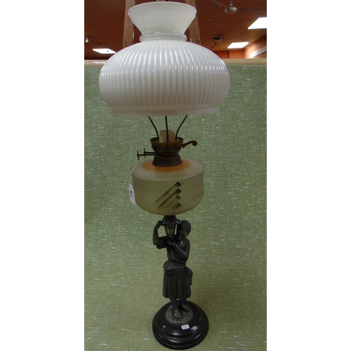 75 - Converted oil lamp, having cream coloured shade, frosted reservoir and the base in the form of an Af... 