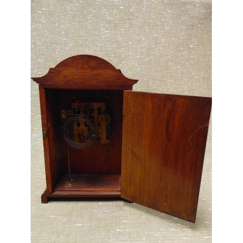 95 - Edwardian oak cased mantle clock, shaped top, Arabic numerals with shell inlay decoration and on bra... 