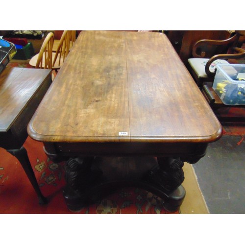 340 - Antique mahogany centre table, the rectangular top having rounded corners , set on shaped acanthus l... 