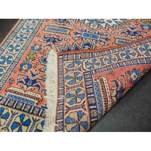 112 - Blue and red ground rug , having geometric pattern, 51 x 31