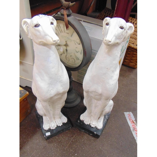 116 - Pair of painted stoneware greyhound figures, each 21