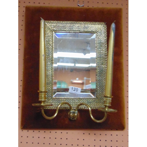 120 - Ornate wall mirror, having plush lined frame and candle sconces.