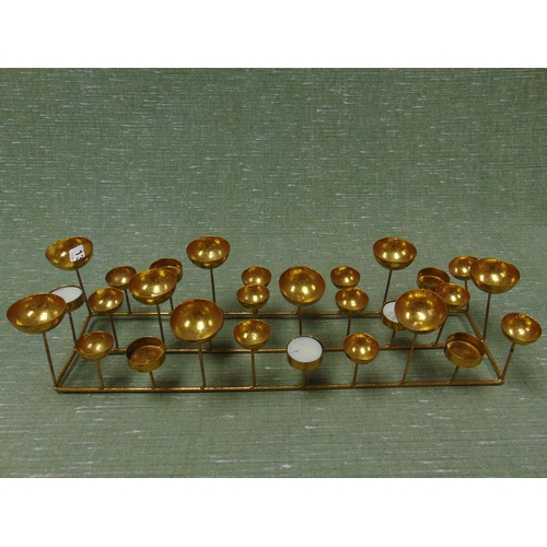 136 - Gilt candle holder.