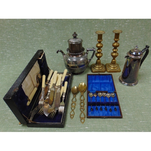 142 - Pair of brass candlesticks, plated self pouring tea pot, etc.