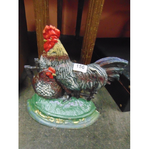 156 - Cast iron cockerel form door stop. 12