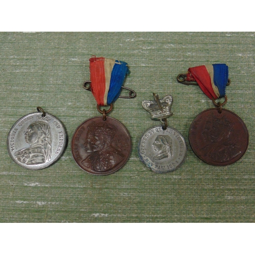 179 - Four commemorative medals, including the 1894 opening of the Manchester Ship canal.